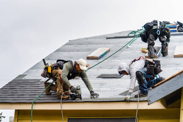 Professional Gutter Installation technician working in Tilghman, MD